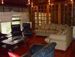 Thabazimbi Guest house lounge with big screen TV
